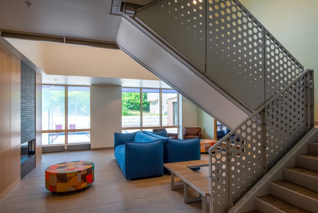 Avenues for Youth interior living room space with windows.