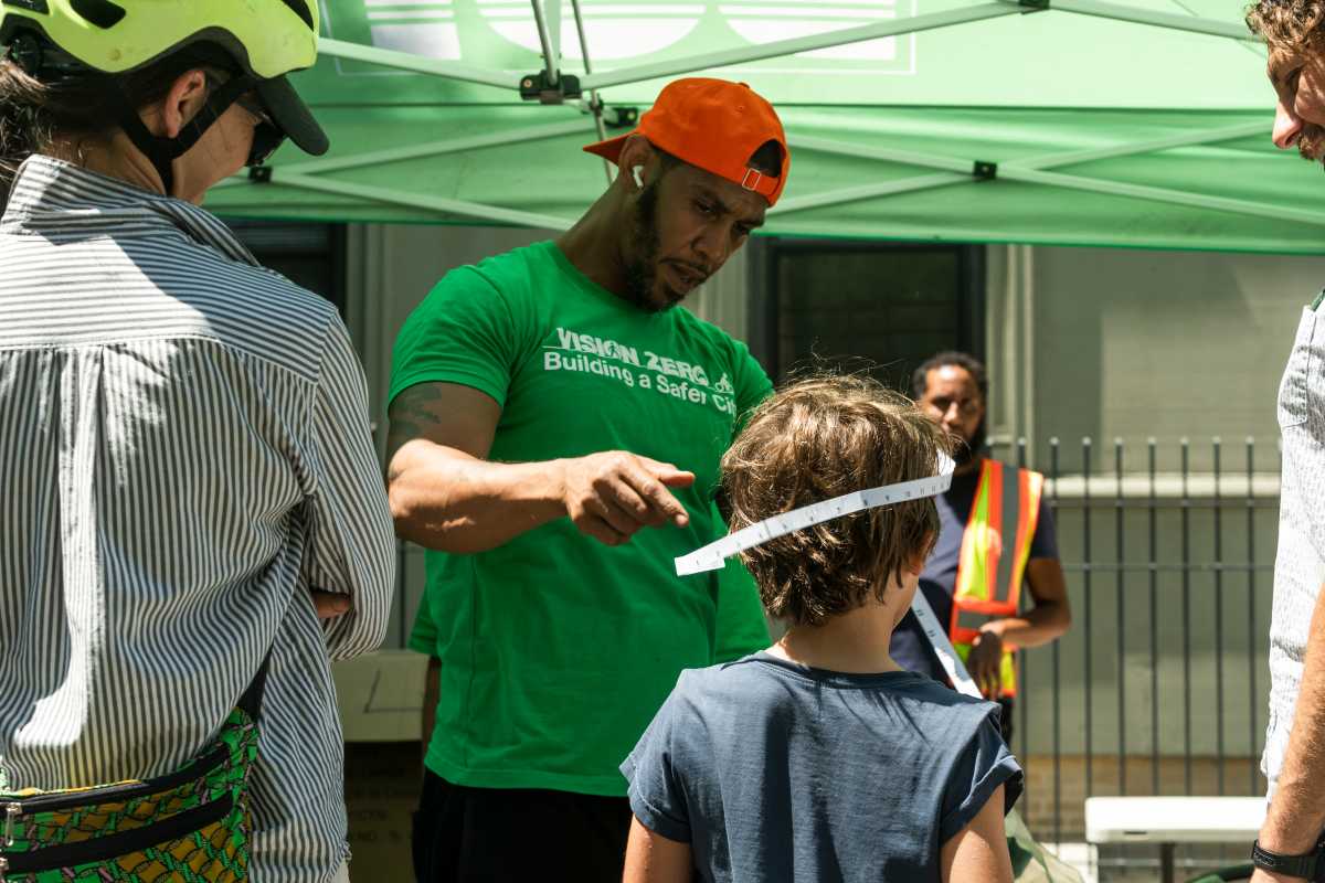 DOT's Vision Zero initiative frequently hosts free helmet fittings and giveaways to promote the use of transportation alternatives.
