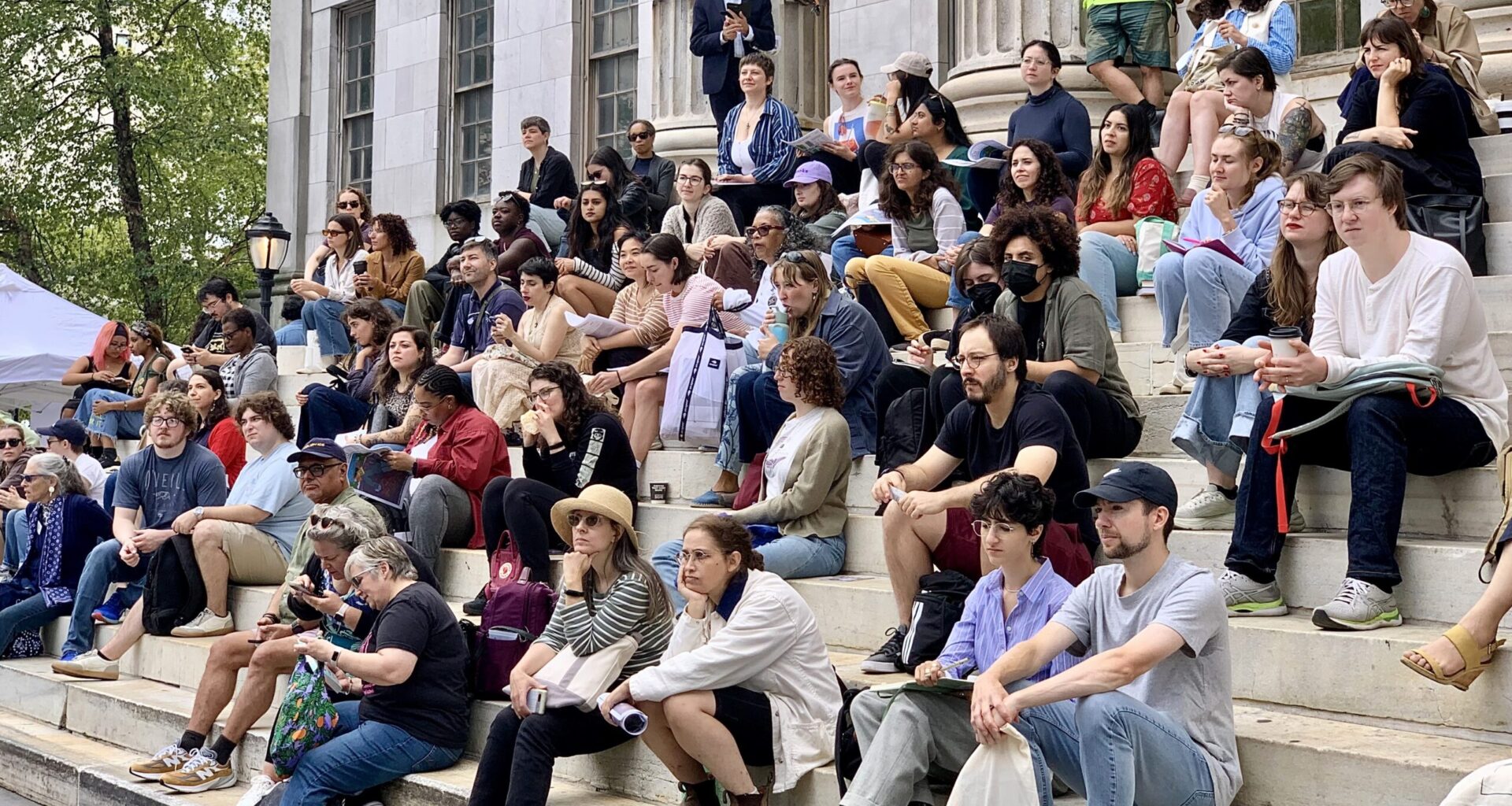 The steps of Brooklyn Borough Hall were a perfect place to take in speakers on the Main Stage at the Brooklyn Book Festival. Photo: Mary Frost, Brooklyn Eagle