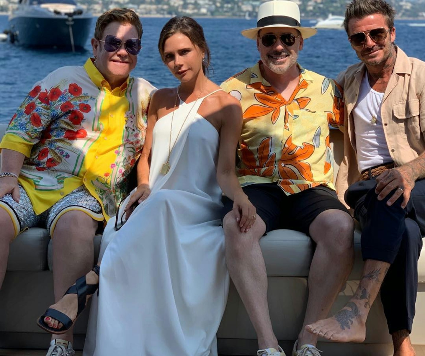 The Beckhams with Elton and David
