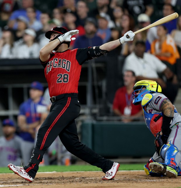 White Sox catcher Jake Rogers hits a two-run walk-off home run in the ninth inning against the Mets on Aug. 21, 2026, at Rate Field. (Chris Sweda/Chicago Tribune)