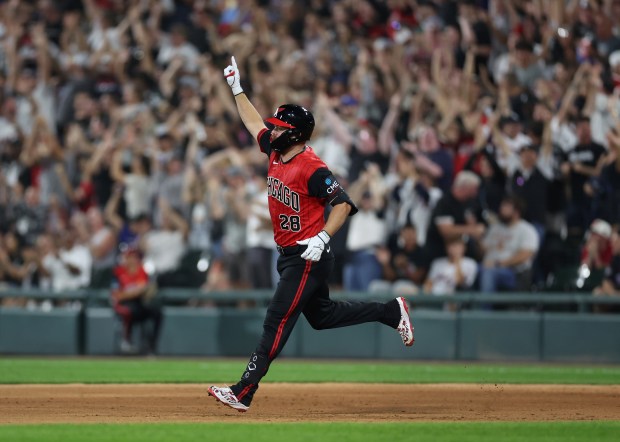 White Sox catcher Jake Rogerscelebrates as he rounds the bases after hitting a two-run walk-off home run in the ninth inning against the Mets on Aug. 21, 2026, at Rate Field. (Chris Sweda/Chicago Tribune)