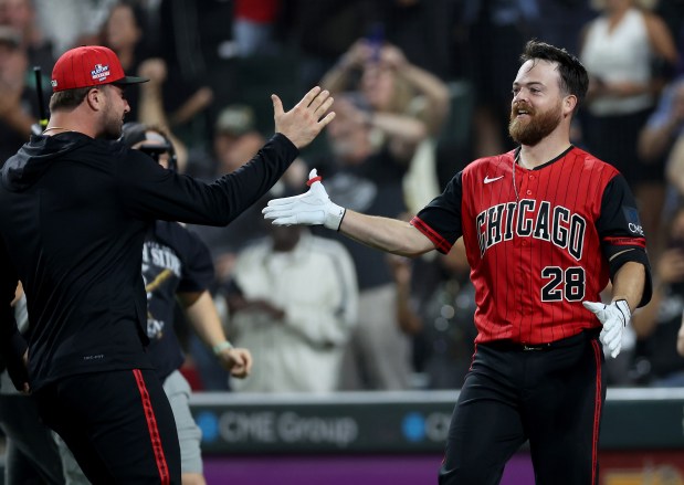 White Sox catcher Jake Rogers (28) celebrates after hitting a two-run walk-off home run in the ninth inning against the Mets on Aug. 21, 2026, at Rate Field. (Chris Sweda/Chicago Tribune)