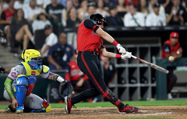 White Sox designated hitter Colson Montgomery hits a solo home run in the sixth inning against the Mets on Aug. 21, 2026, at Rate Field. (Chris Sweda/Chicago Tribune)