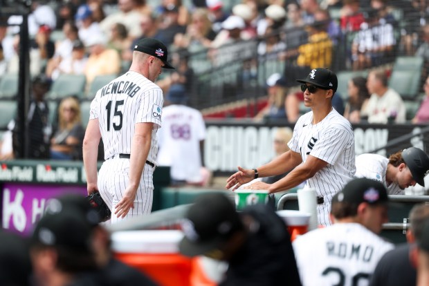 Chicago White Sox manager Will Venable (1) waits in the dugout for pitcher Sean Newcomb (15) after the top of the first inning against the New York Mets at Rate Field on Aug. 23, 2026. (Eileen T. Meslar/Chicago Tribune)