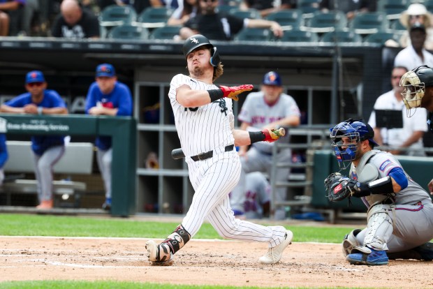 Chicago White Sox second baseman Chase Meidroth (10) swings and misses in the fourth inning against the New York Mets at Rate Field on Aug. 23, 2026. (Eileen T. Meslar/Chicago Tribune)