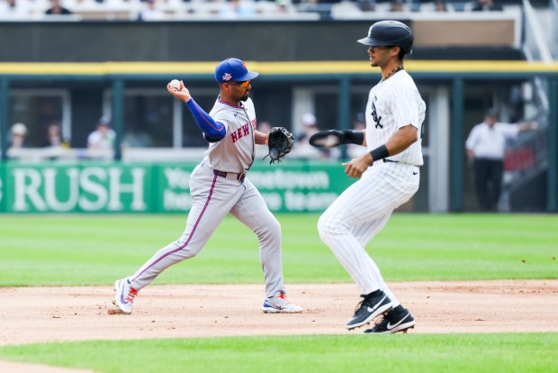 New York Mets second baseman Marcus Semien (10) throws to first base in the second inning against the Chicago White Sox at Rate Field on Aug. 23, 2026. (Eileen T. Meslar/Chicago Tribune)
