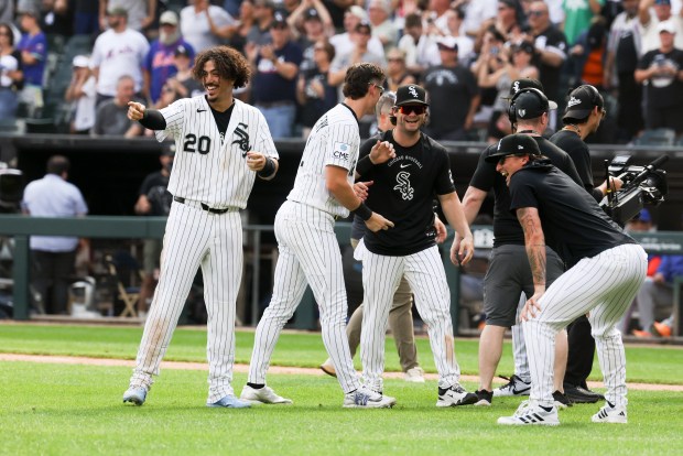 Chicago White Sox players celebrate after Tristan Peters (29) hit a home run in the ninth inning to win the game 2-1 against the New York Mets at Rate Field on Aug. 23, 2026. (Eileen T. Meslar/Chicago Tribune)
