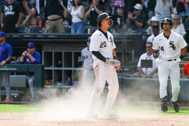 Chicago White Sox third baseman Miguel Vargas (20) celebrates after scoring in the eighth inning against the New York Mets at Rate Field on Aug. 23, 2026. (Eileen T. Meslar/Chicago Tribune)