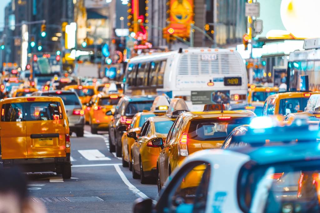 Urban jungle scene with cars and traffic in New york city