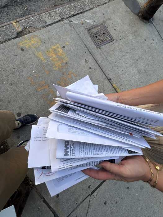 person holding papers