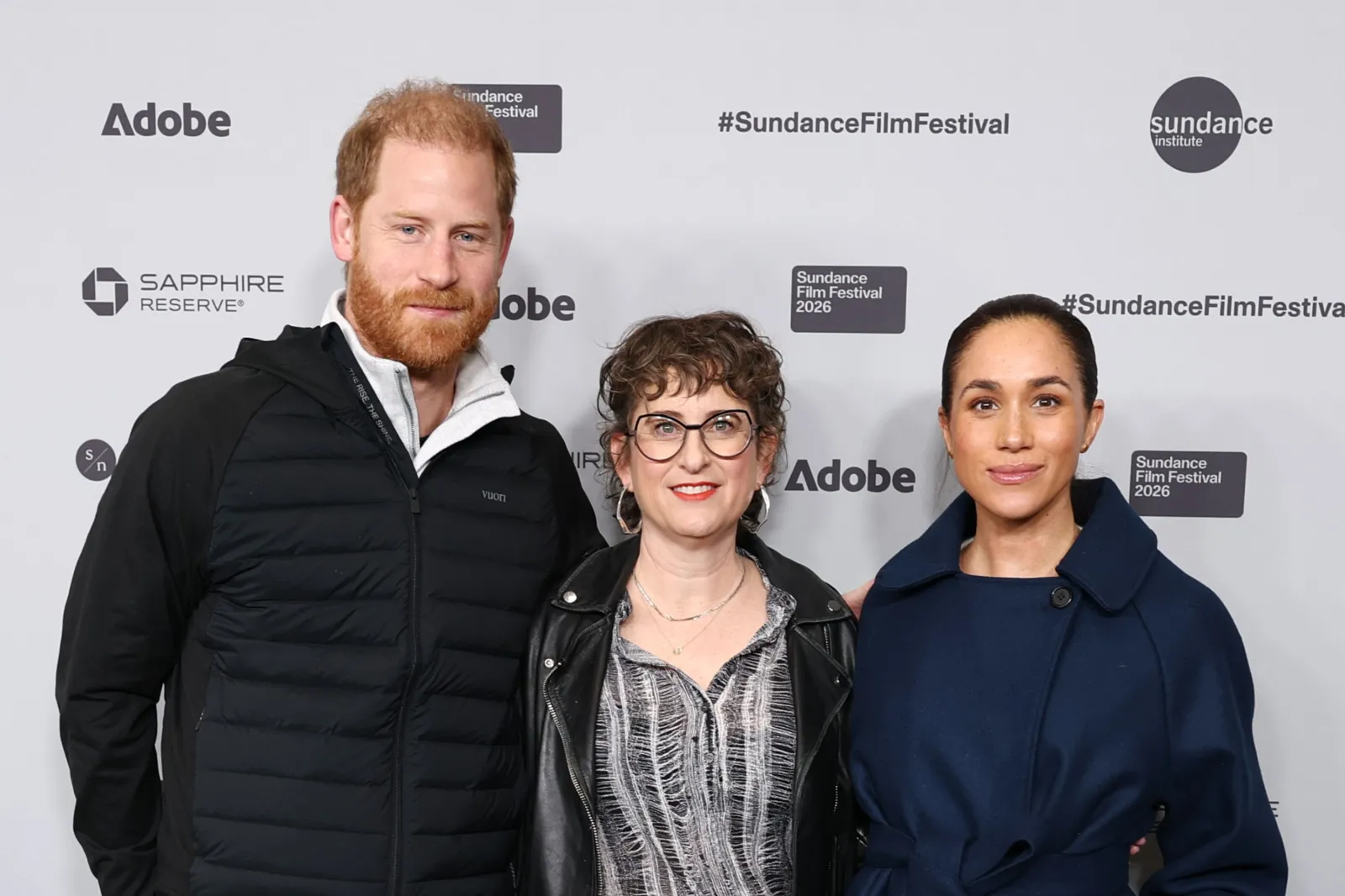 Prince Harry and Meghan Markle pose for a photograph with Cookie Queens director Alysa Nahmias at the 2026 Sundance Film Festival at Eccles Center Theater,  in Park City, Utah, on January 25, 2026.