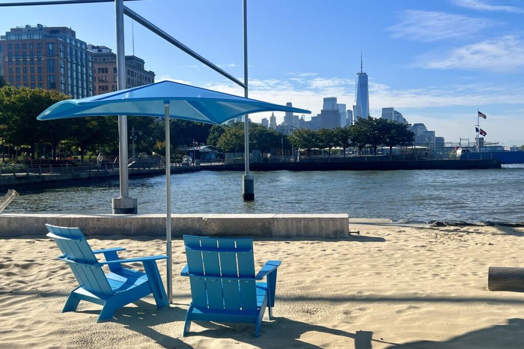 Manhattan’s first 5.5-acre public beach boasts 1,200 tons of sand, skyline views, and 20 million water-filtering oysters