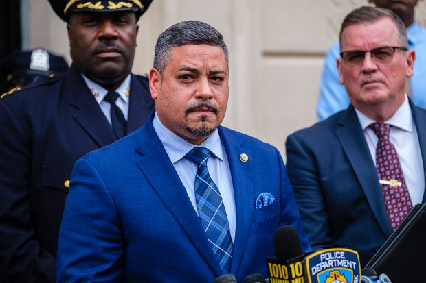 NYPD Commissioner Edward Caban speaks during a news conference outside the NYPD's 102nd Precinct stationhouse in Queens on Saturday, July 8, 2023. (Jeff Bachner for New York Daily News)