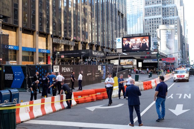 Police are pictured at 7th Ave. and W. 31st St. in Manhattan, New York on Monday, Aug. 23, 2021. (Gardiner Anderson for New York Daily News)