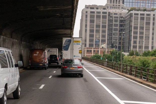 A section of the BQE beneath the Brooklyn Heights Promenade was reduced from three lanes to two in 2021.