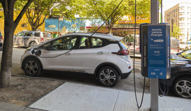 A car plugged into a curbside electric vehicle charger in the Bronx. Bedford-Stuyvesant, Carroll Gardens and Red Hook will soon get these ports as well. Photo: NYC DOT