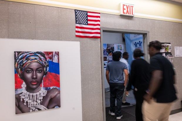 NEW YORK, NEW YORK - JULY 28: Haitians living in Brooklyn join local politicians and others at an Immigrant Resource Fair and Know Your Rights Event in an area of Brooklyn known as 'Little Haiti' on July 28, 2026, in New York City. The Supreme Court ruled in June to allow the Trump Administration to end Temporary Protected Status to over 300,000 Haitian nationals. (Photo by Spencer Platt/Getty Images)