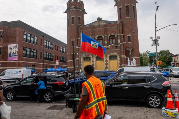 NEW YORK, NEW YORK - JULY 28: People walk through an area of Brooklyn known as 'Little Haiti' on July 28, 2026, in New York City. The Supreme Court ruled in June to allow the Trump Administration to end Temporary Protected Status to over 300,000 Haitian nationals. (Photo by Spencer Platt/Getty Images)