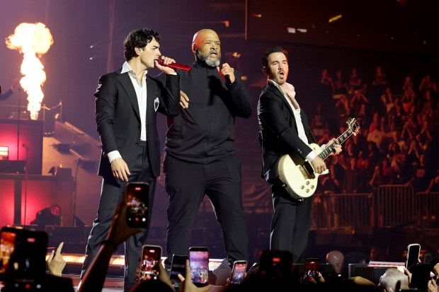 NEW YORK, NEW YORK - AUGUST 20: (L-R) Joe Jonas, Big Rob, and Kevin Jonas perform onstage during Jonas Brothers: The Burning Up Tour All Over Again - New York at Madison Square Garden on August 20, 2026 in New York City. (Photo by Theo Wargo/Getty Images for Live Nation)