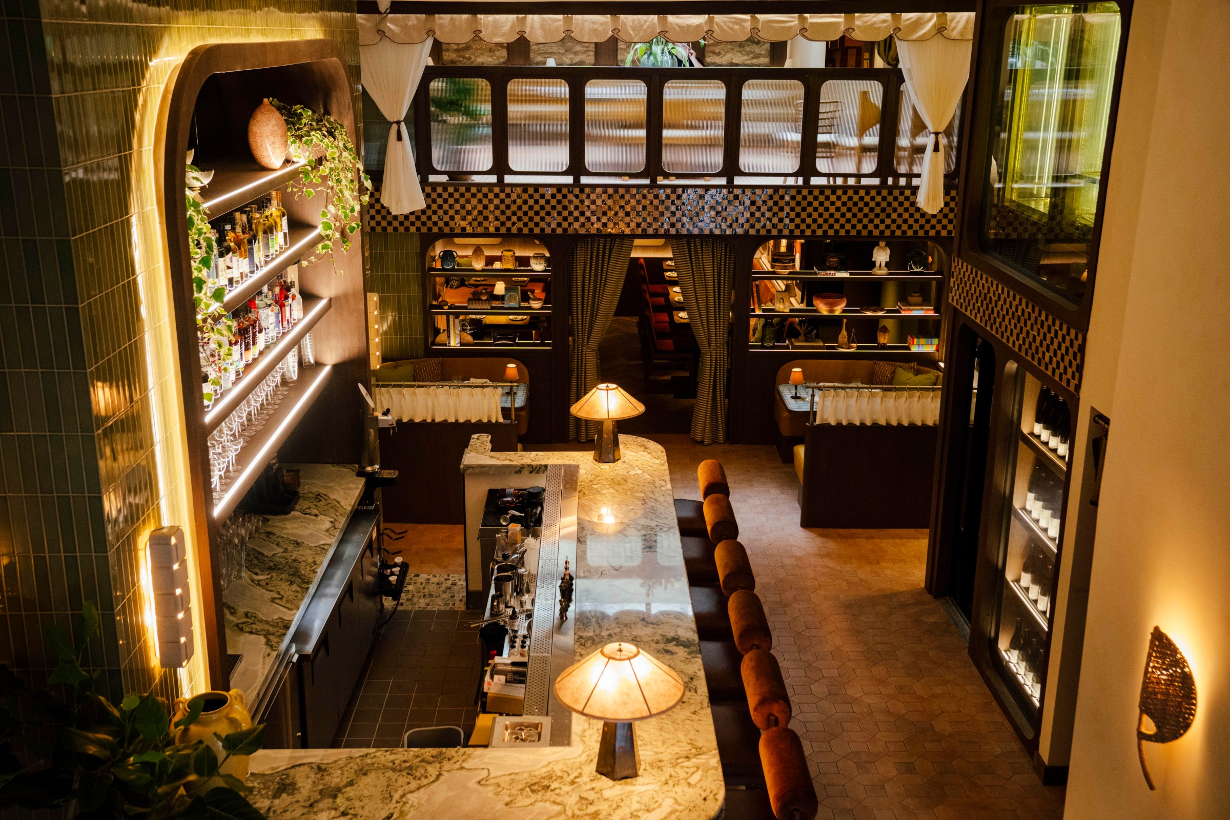 A restaurant bar and dining room.