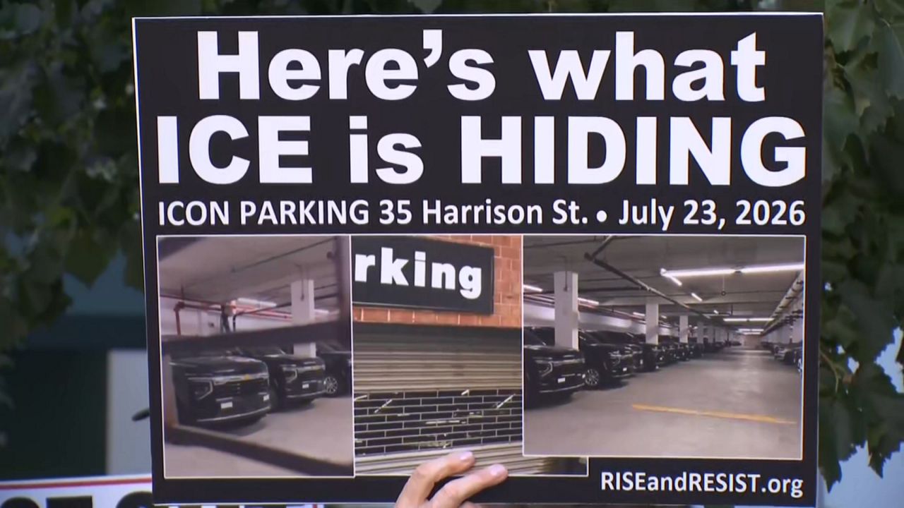 According to protesters, federal immigration officials may have found a place to park at an Icon garage in Tribeca, but not a place to operate unnoticed. (Spectrum News NY1)