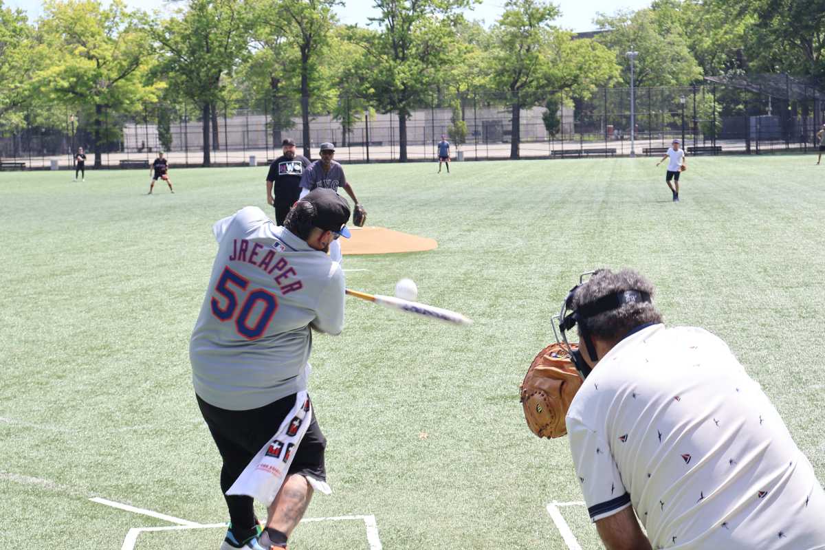 The Queens community came together for the fourth annual Friends and Family Softball Game.