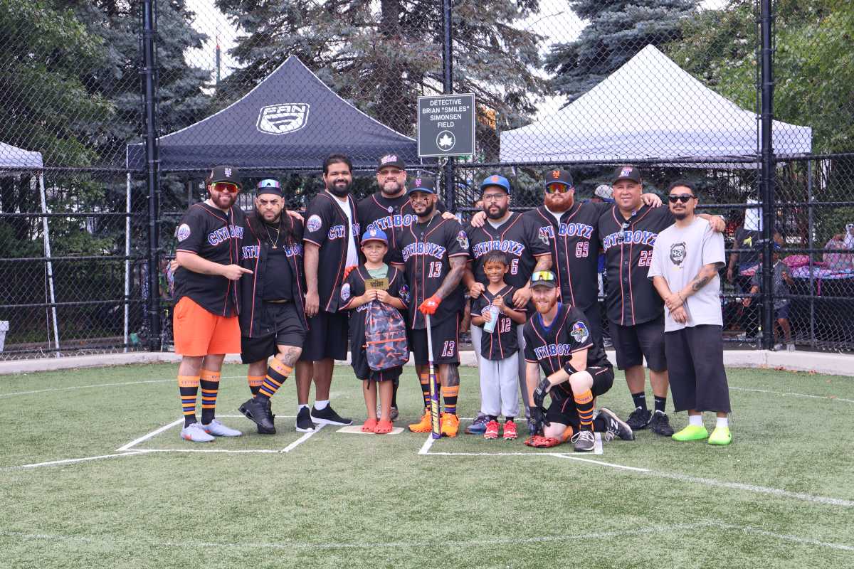 The Queens community came together for the fourth annual Friends and Family Softball Game.