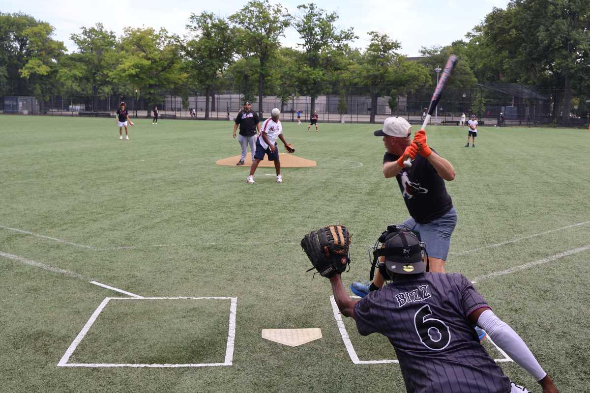 The Queens community came together for the fourth annual Friends and Family Softball Game.