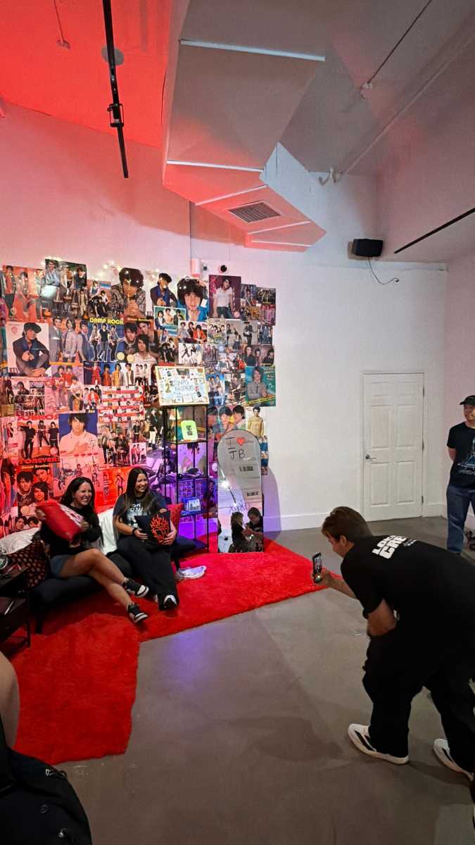 people enjoying the Jonas Brothers pop-up
