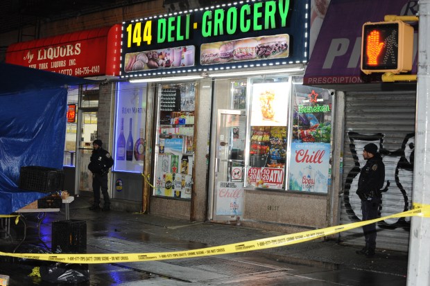 Police investigate after Tykeem Berry was shot inside a deli at 144 Nagle Ave in Manhattan on December 15, 2022.