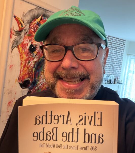 John Cirillo holds up his book. Photo: John Cirillo