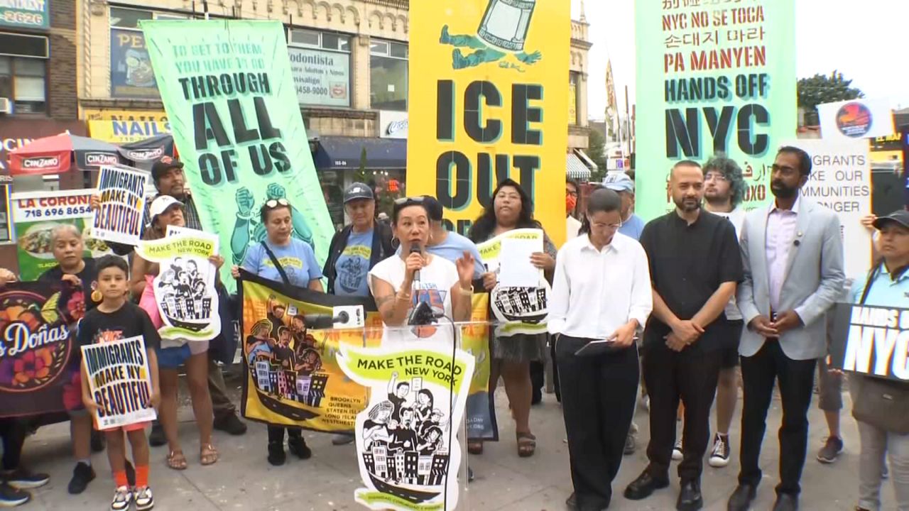 Dozens of people joined the rally on Monday in Queens. (Spectrum News NY1)