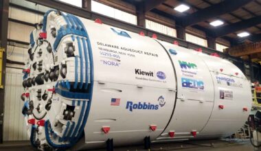 A 1,350-ton machine named Nora arrived in 22 pieces, took four months to bolt together and bored 2.5 miles under the Hudson to carry half of New York’s drinking water around a leaking crack, and the tunnel she cut has never held a drop