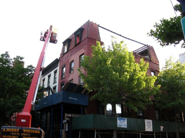 The top floors of the building at 100 Clark St. were demolished in May 2008. Photo: MK Metz, McBrooklyn blog