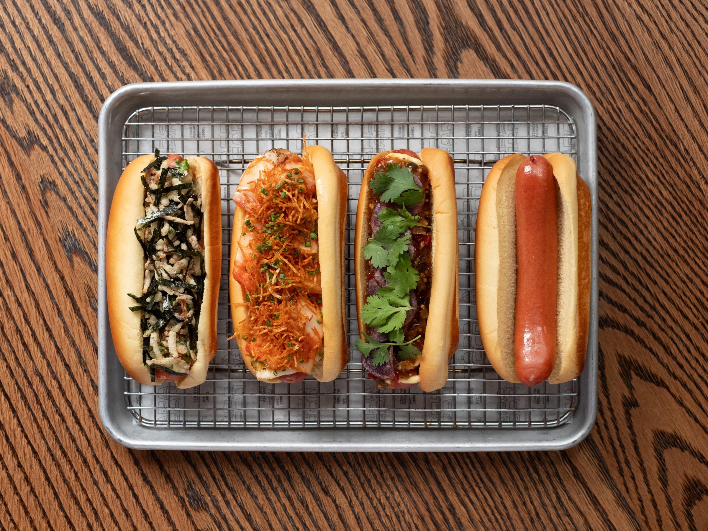 A tray of hot dogs.