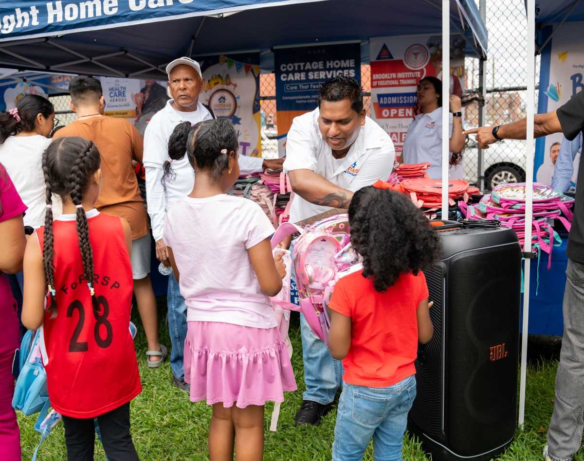 More than 500 Queens children join back-to-school giveback and family day