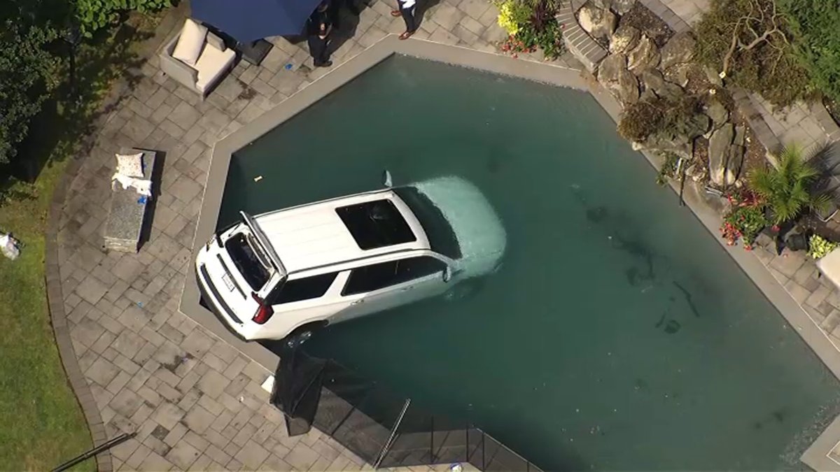 Long Island woman dies after crashing SUV into backyard pool – NBC New York