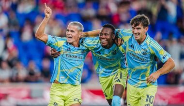 Cavan Sullivan (left) celebrates with Danley Jean Jacques (center) and Milan Iloski after scoring his goal in the Union's win at Red Bull New York on Saturday.