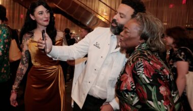 Hanna Williams looks on as husband Chad and Lynette Brown-Sow do a Facetime after the Michelin Awards at the Kimmel Center in Philadelphia on Nov. 18, 2025.