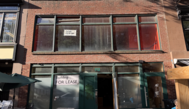 A “For Lease” sign hangs in the window of the empty storefront at 112 Montague St. Photo: Sophie Penenberg/Brooklyn Eagle