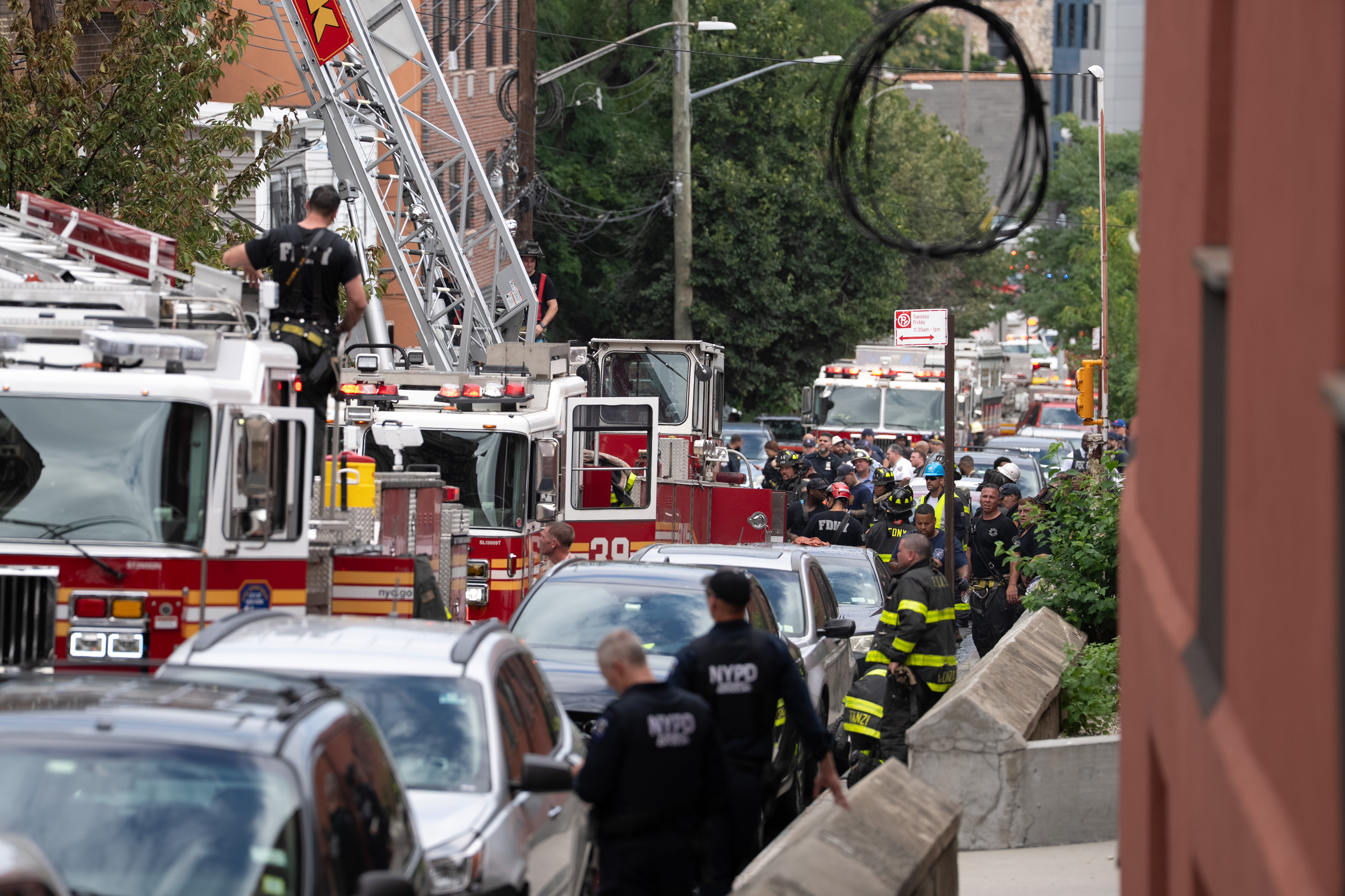 FDNY members work a fire at 374 E. 209th St. Wednesday Aug. 5, 2026 in the Bronx, New York. (Barry Williams/ New York Daily News)