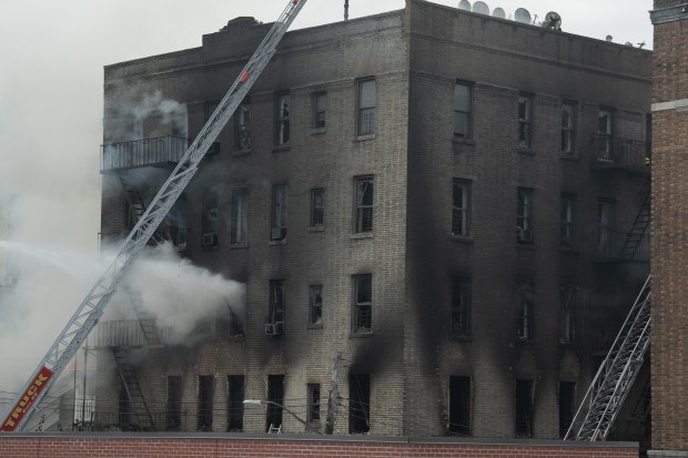 FDNY members work a fire at 374 E. 209th St. Wednesday Aug. 5, 2026 in the Bronx, New York. (Barry Williams/ New York Daily News)