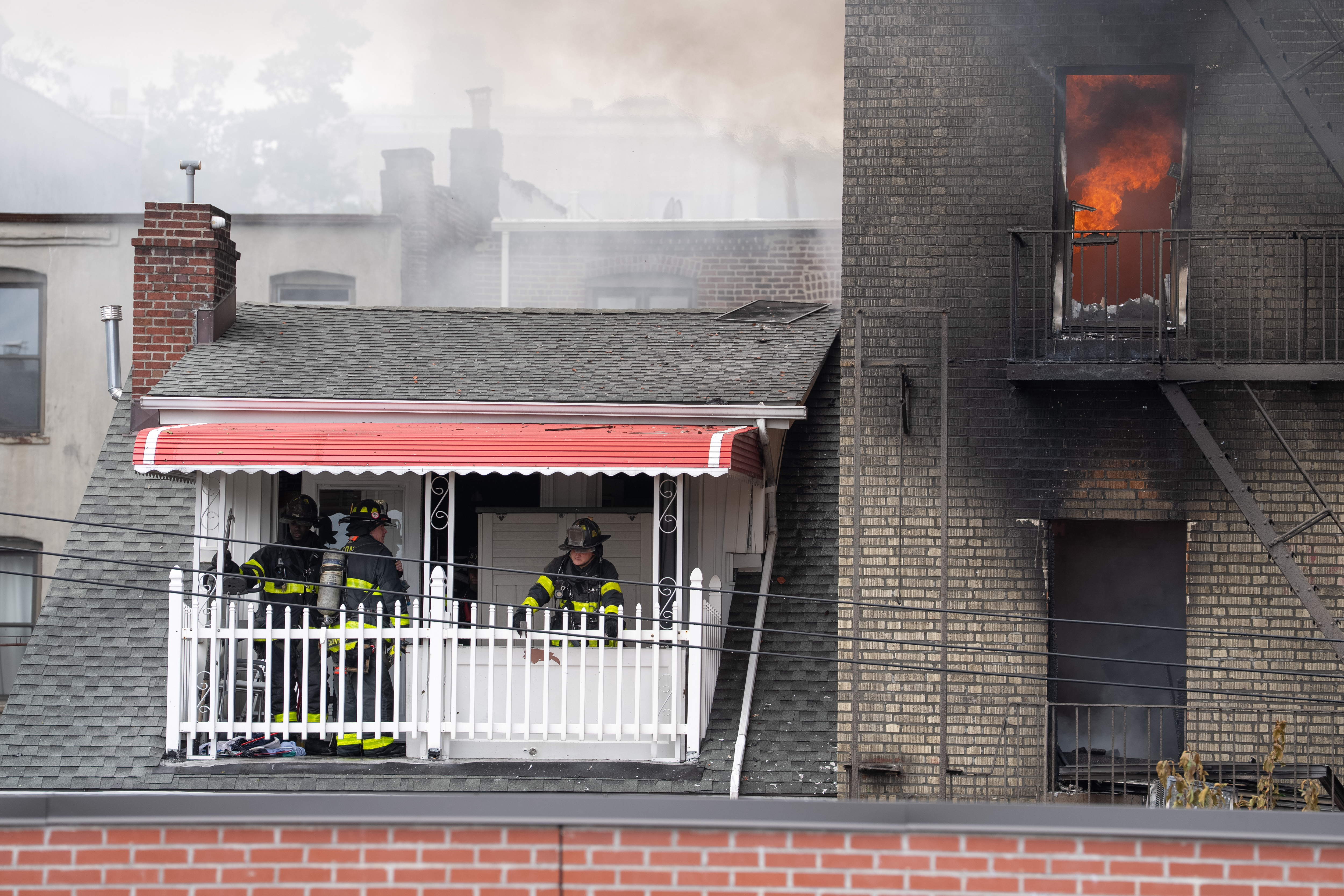 FDNY members work a fire at 374 E. 209th St. Wednesday Aug. 5, 2026 in the Bronx, New York. (Barry Williams/ New York Daily News)