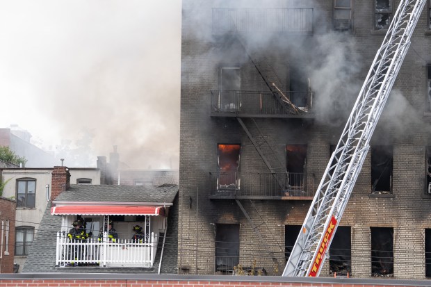 FDNY firefighters on the scene of the massive Bronx fire in a five-story apartment building on E. 209th St. near Parkside Place in the Bronx on Wednesday, Aug. 5, 2026. (Barry Williams/ New York Daily News)