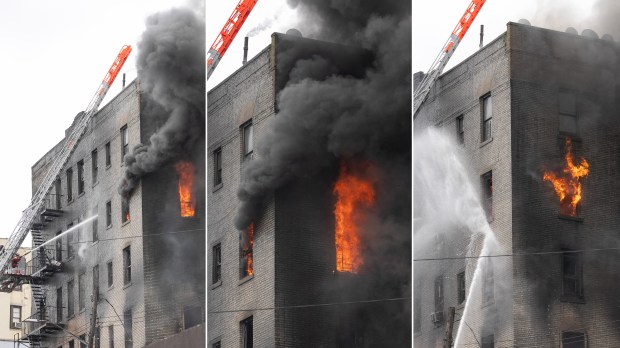 FDNY firefighters work the scene during a massive Bronx fire in a five-story apartment building on E. 209th St. near Parkside Place in the Bronx on Wednesday, Aug. 5, 2026. (Barry Williams/ New York Daily News)