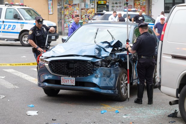 The NYPD Highway Patrol investigates after a pedestrian was fatally struck by a driver who fled the scene on Knickerbocker Avenue and Eldert Street in Bushwick, Brooklyn, New York City on Thursday, May 9, 2024. (Gardiner Anderson for New York Daily News)