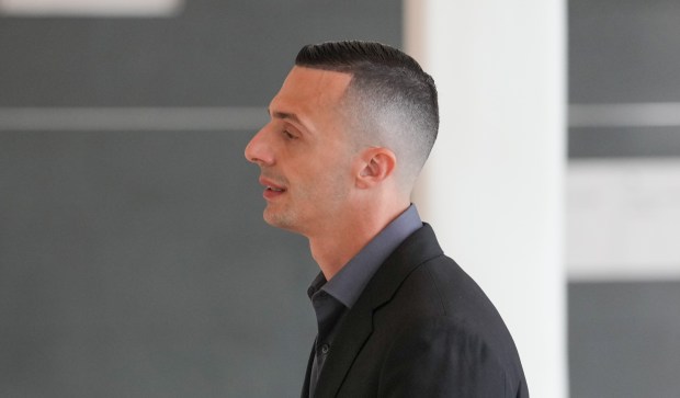 NYPD Officer Omar Habib walks into a courtroom in Bronx Supreme Court on Wednesday, July 29, 2026 in the Bronx. 