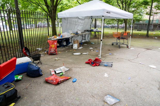 The scene after a masked gunman shot eight people at a Fourth of July cookout on W. 30th St. in Coney Island on Saturday, July 4.