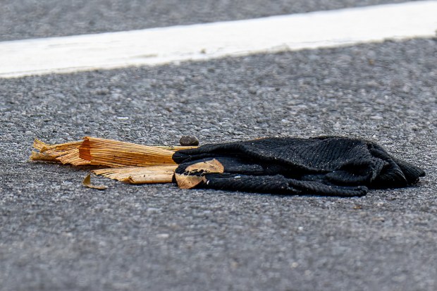 Police investigate after a 66-year-old man was fatally struck by a hit-and-run driver while crossing 9th Ave. mid-block near W. 55th St. in Hell's Kitchen, Manhattan, on Saturday, Aug. 8, 2026. (Theodore Parisienne / New York Daily News)